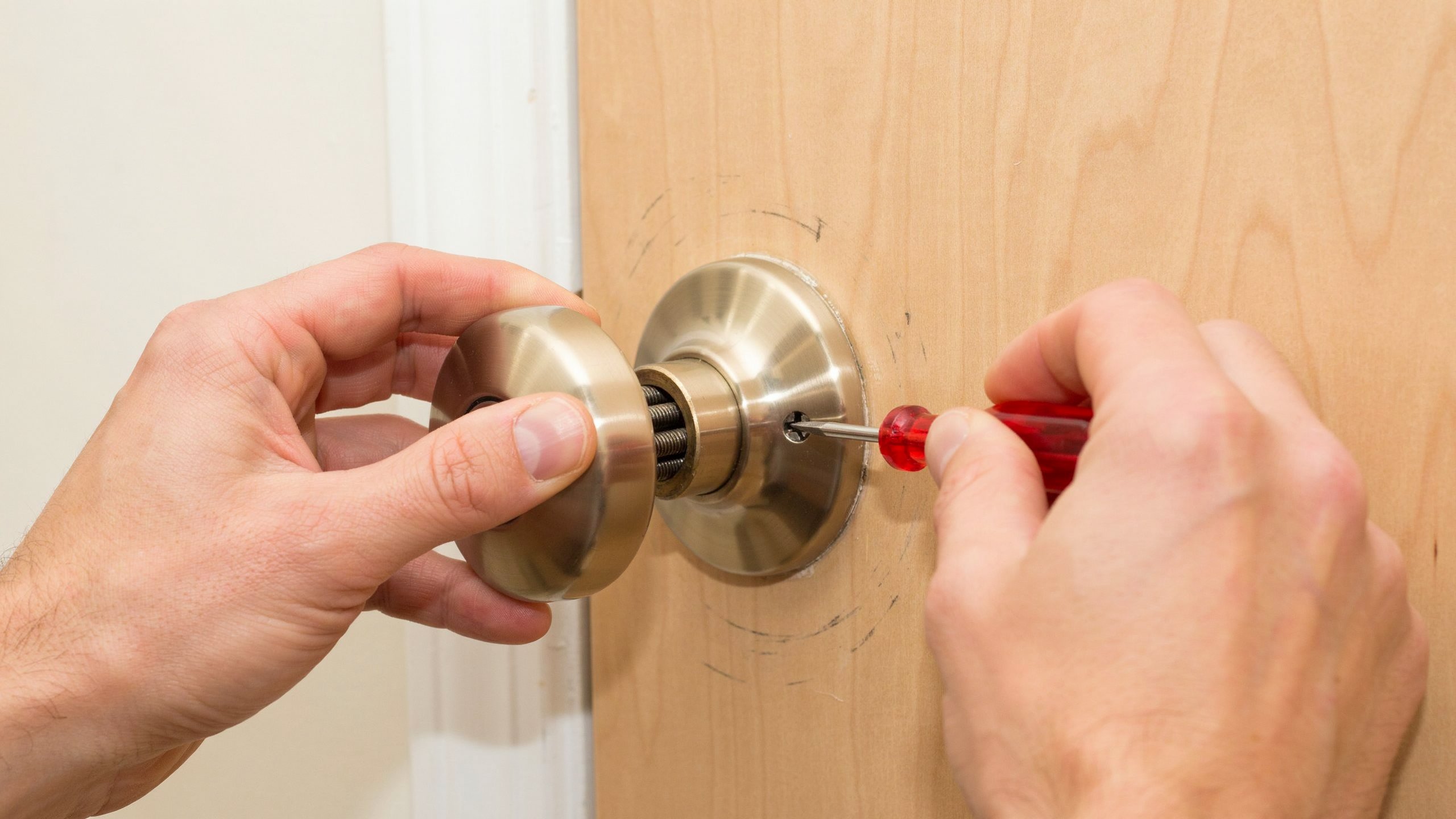 remove-doorknob-rose-plate-hidden-screw Removing a doorknob rose plate to access hidden mounting screws